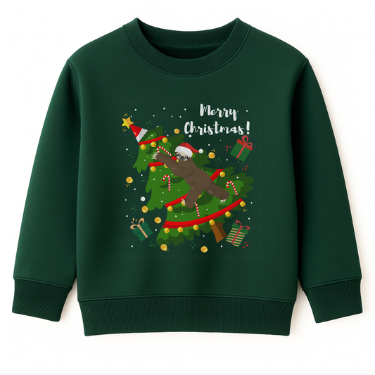 Dark green kids Christmas sweatshirt with a sloth climbing and toppling a decorated Christmas tree, surrounded by presents and snowflakes.