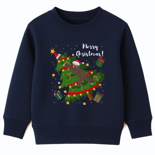 Kids navy Christmas sweatshirt with a sloth climbing and toppling a decorated Christmas tree, surrounded by presents and snowflakes.