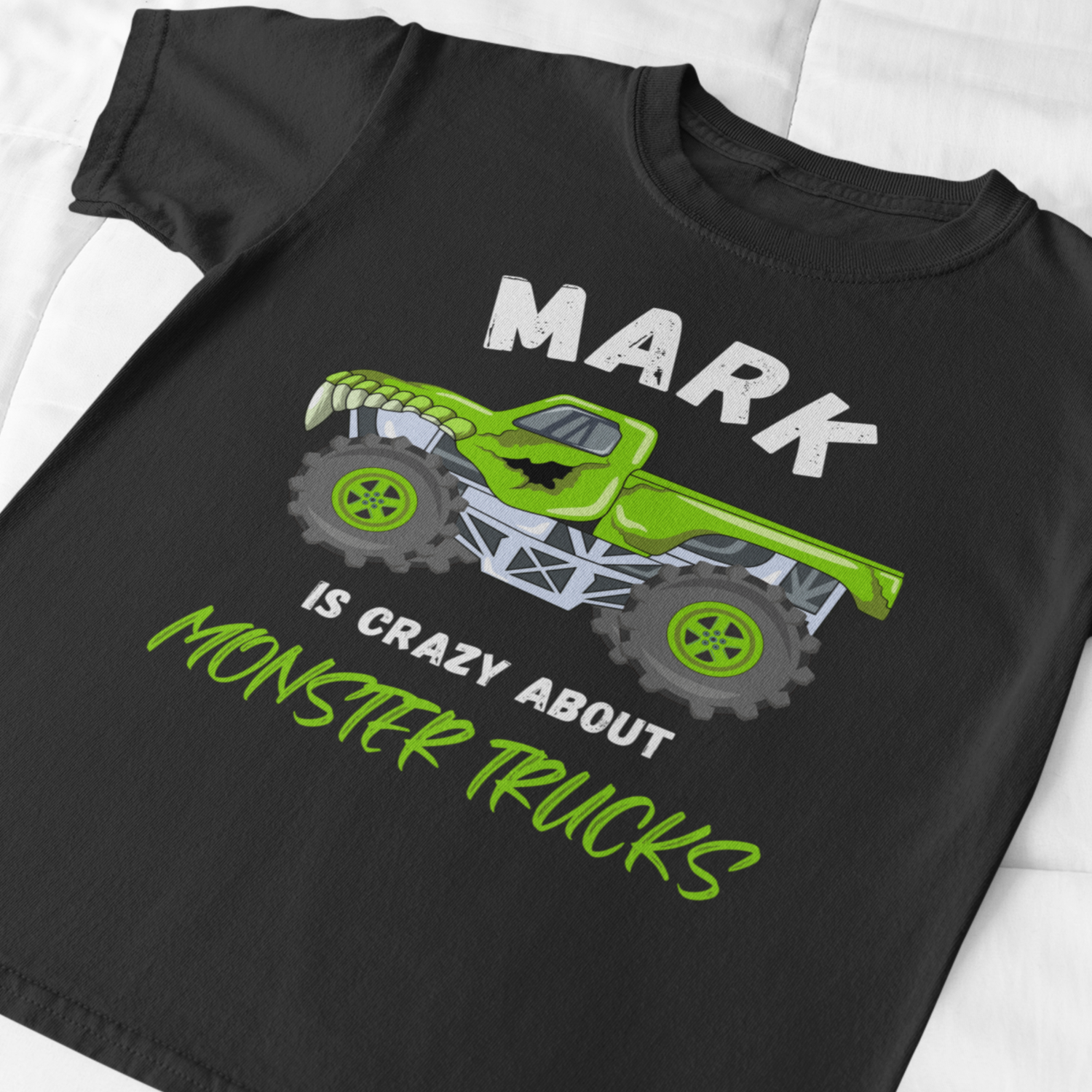 Kids clack crewneck t-shirt with green monster truck graphic.