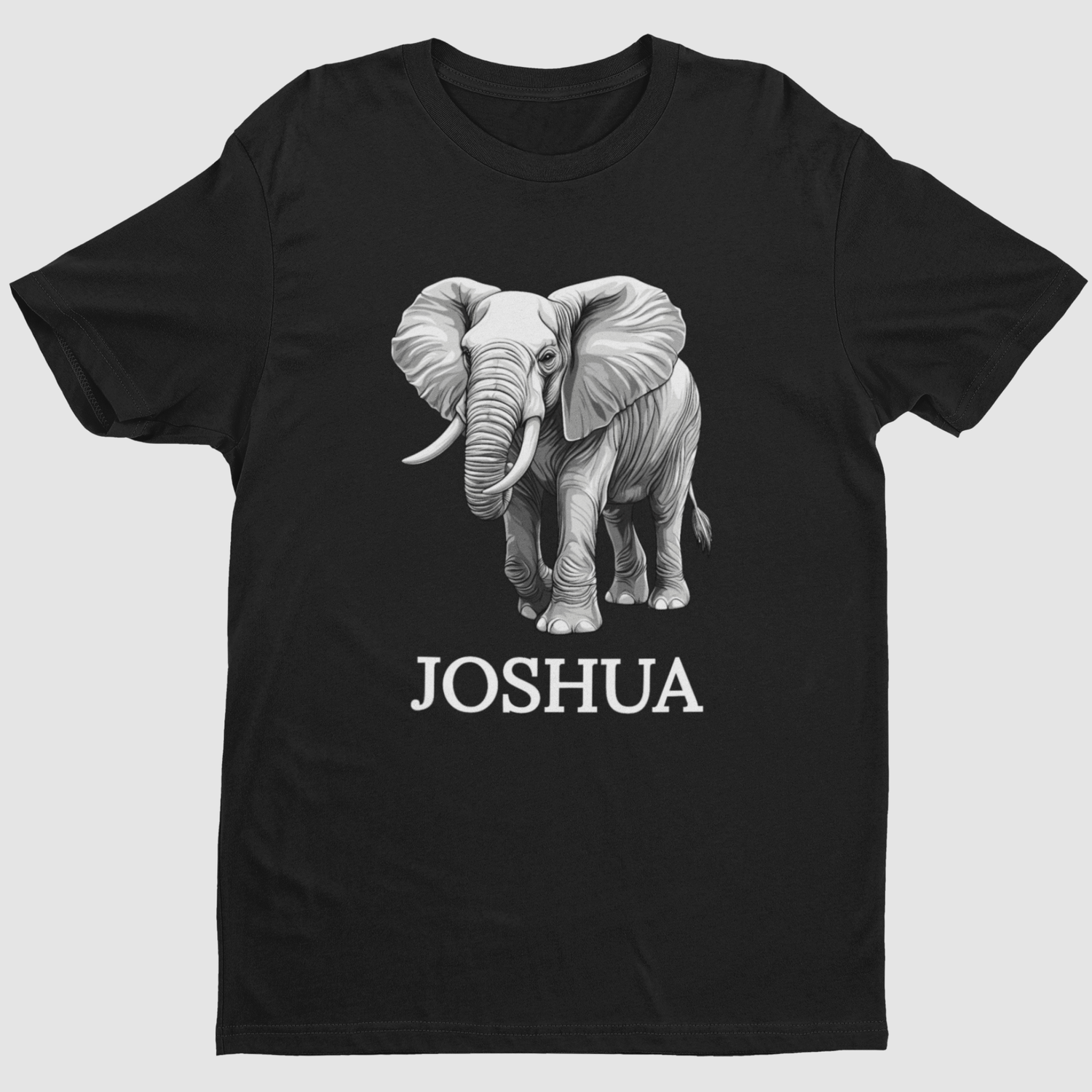 Kids black cotton t-shirt with a graphic of an elephant and the name 'Joshua' printed underneath - flat-lay product