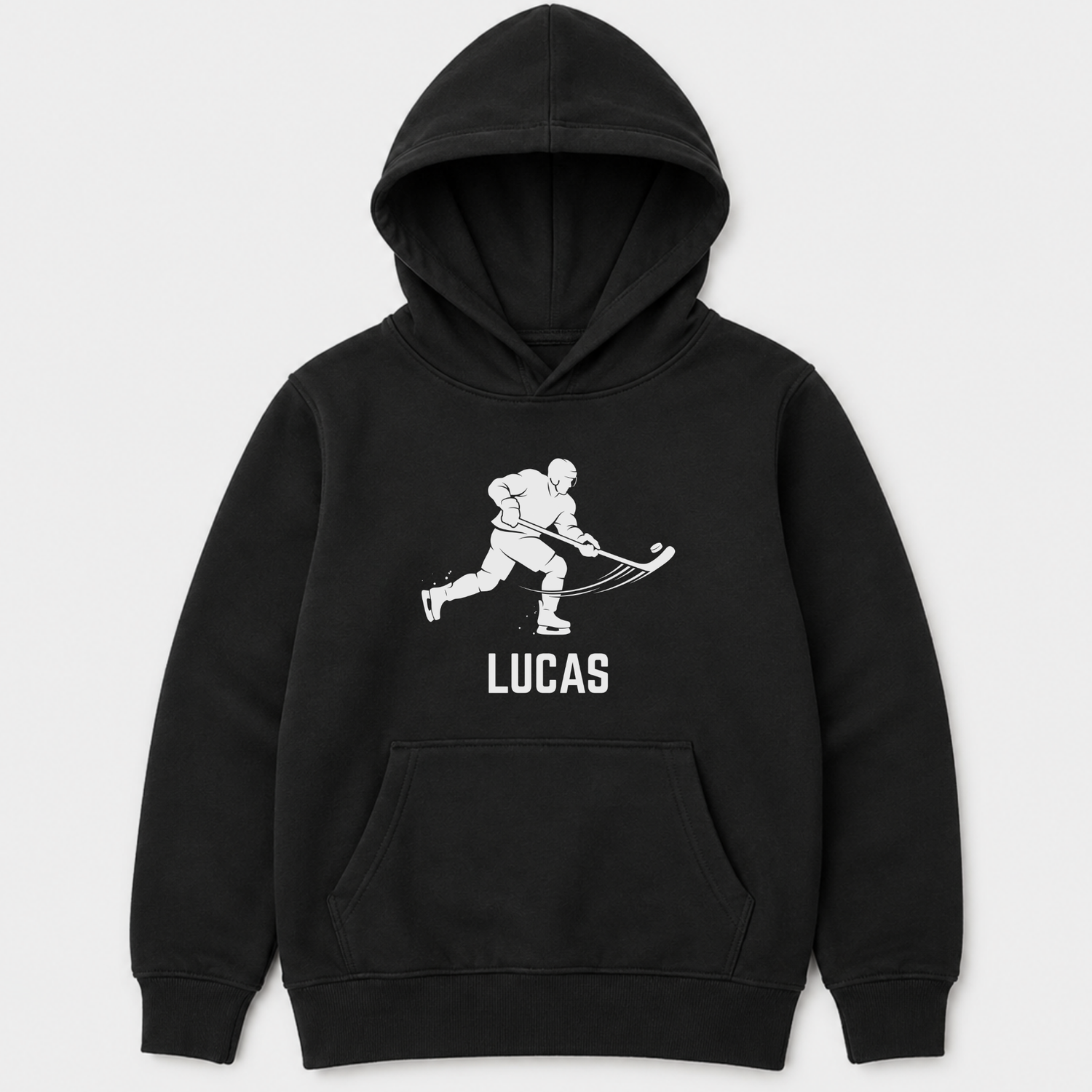 Kids black pullover hoodie with a white graphic of a hockey player and the name 'LUCAS' printed on the chest, displayed against a light grey background.