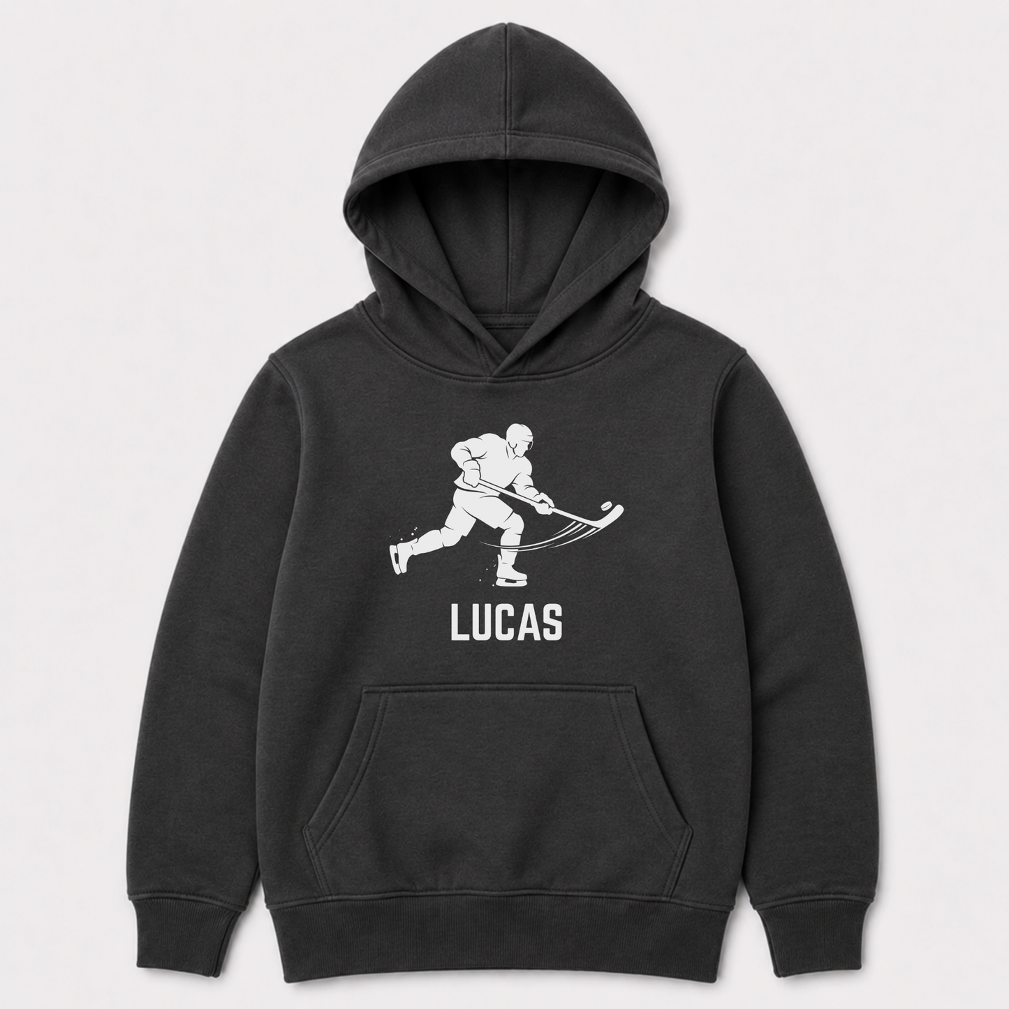 Children's dark grey pullover hoodie with a white graphic of a hockey player and a personalised name printed underneath.