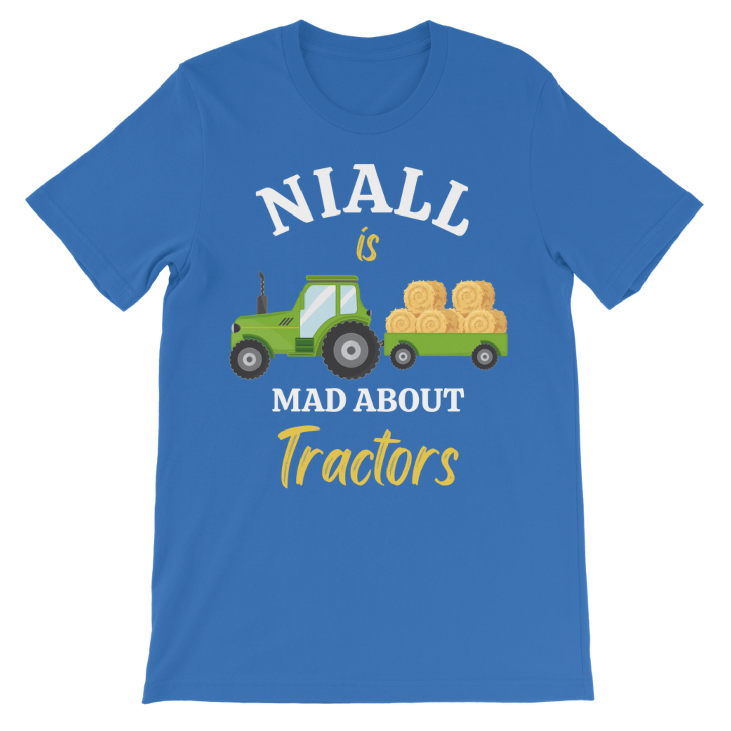 A kids royal blue short-sleeve t-shirt with a graphic print on the front. The graphic features a green cartoon tractor pulling a trailer loaded with golden hay bales, with the text 'NIALL is MAD ABOUT Tractors' in white and yellow lettering.