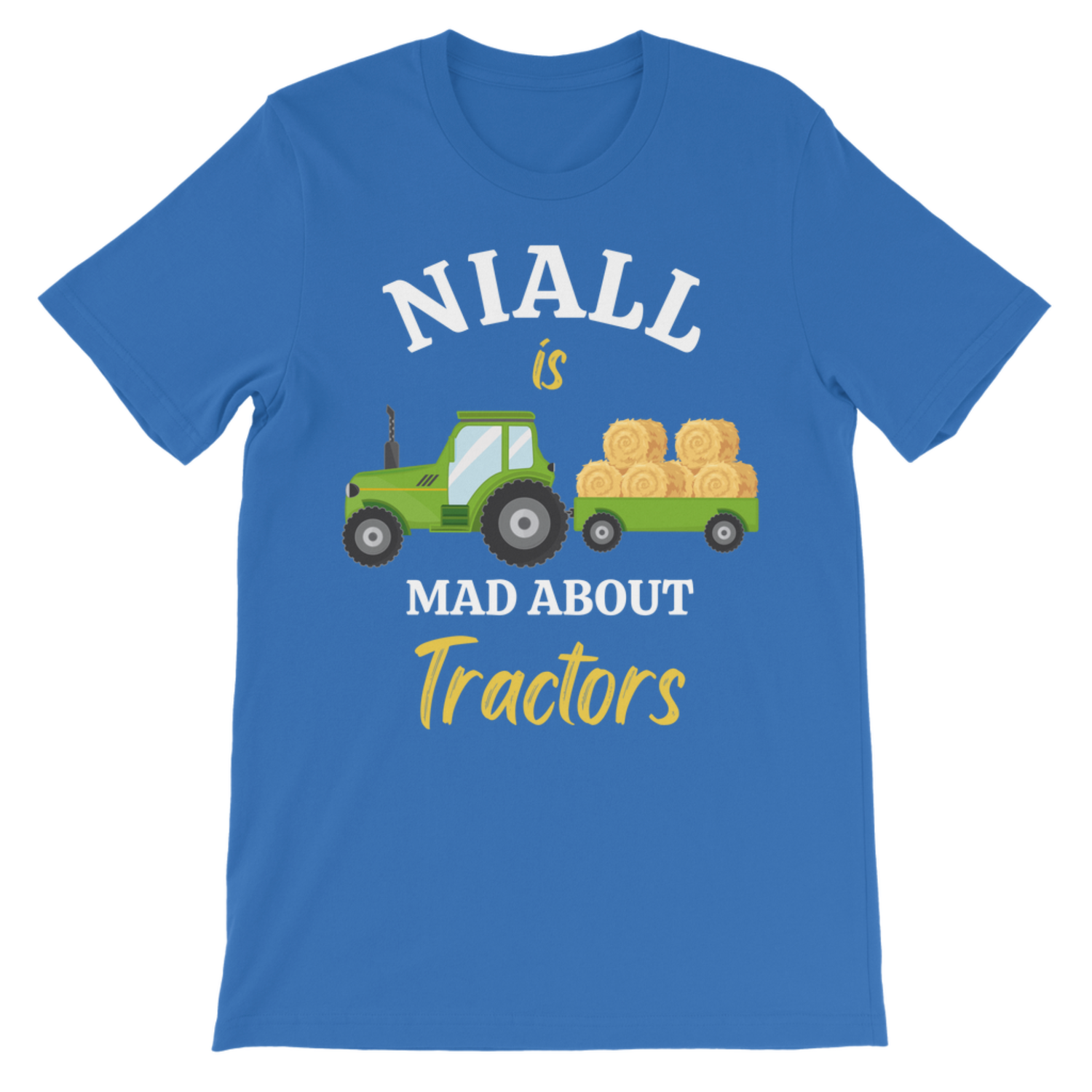 A kids royal blue short-sleeve t-shirt with a graphic print on the front. The graphic features a green cartoon tractor pulling a trailer loaded with golden hay bales, with the text 'NIALL is MAD ABOUT Tractors' in white and yellow lettering.