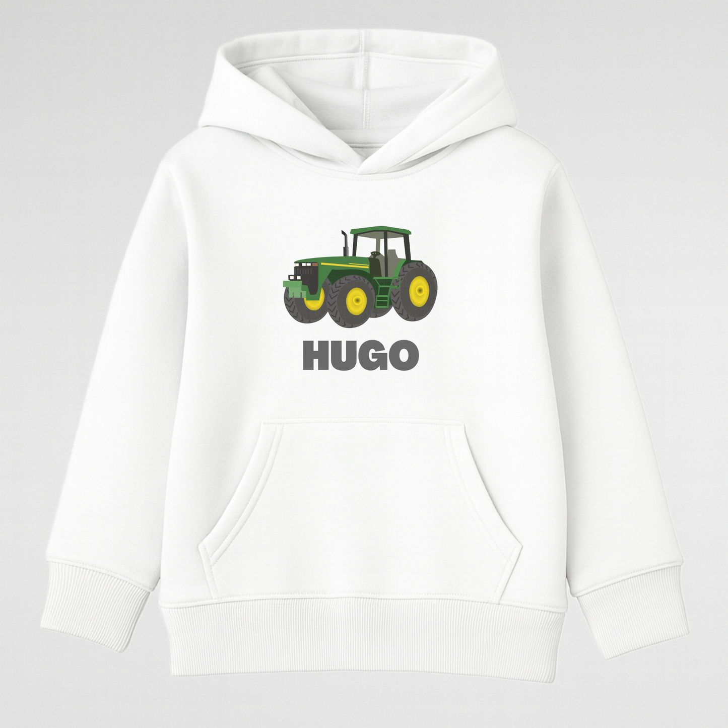 Flat lay of white kids personalised tractor hoodie showing tractor graphic and name print, product detail image.