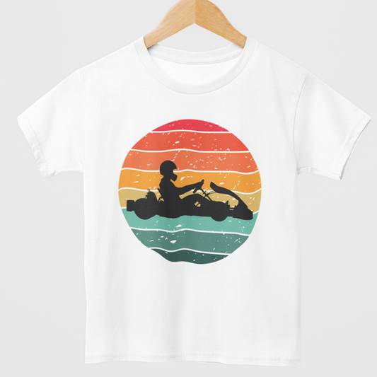Kids white cotton t-shirt featuring a go-kart with retro sunset background - styled on a wooden hanger