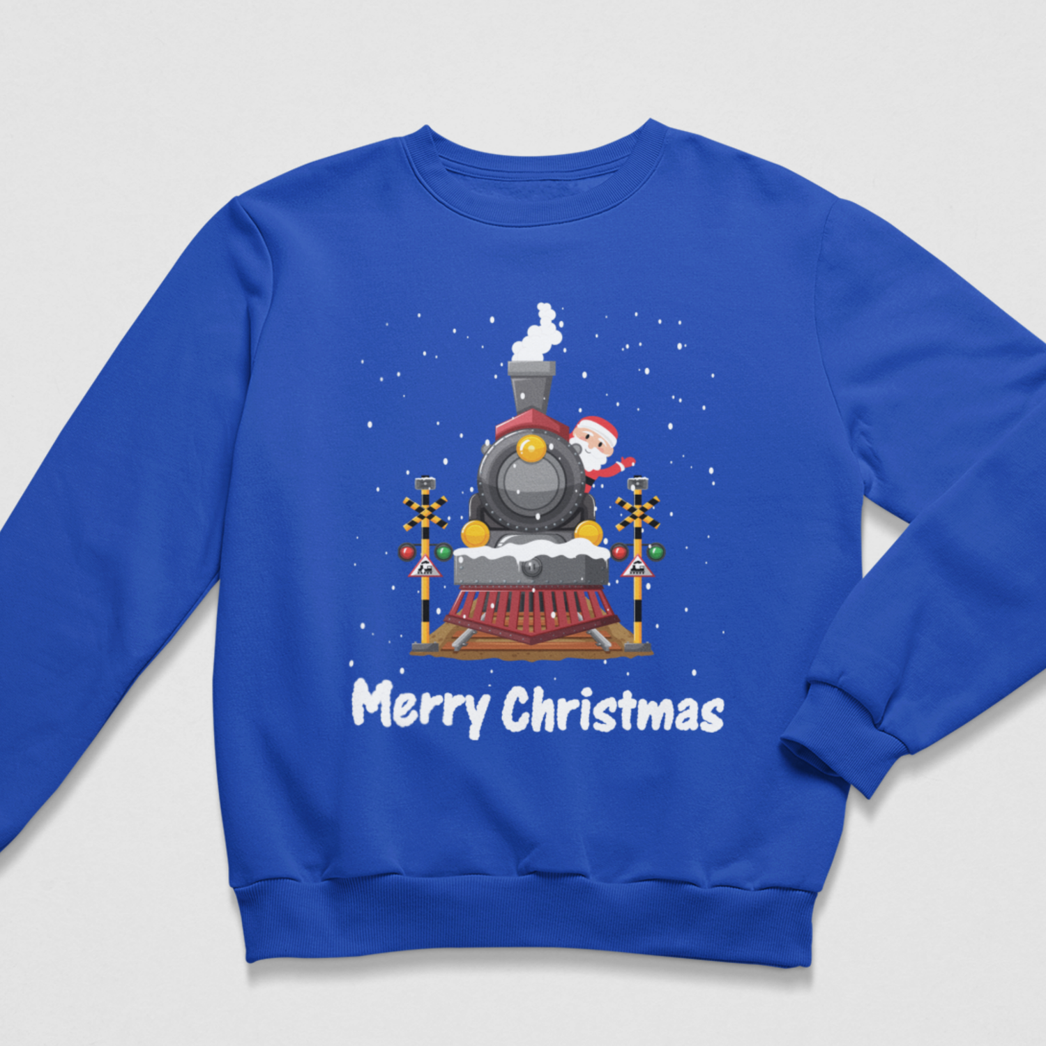 Royal blue kids Christmas jumper featuring Santa on a festive steam train with snowy details and Merry Christmas text.