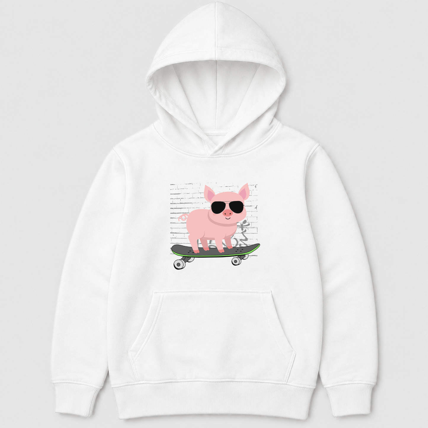White kids skateboarding pig hoodie with a pink pig wearing black sunglasses on a skateboard in front of a brick wall graphic.