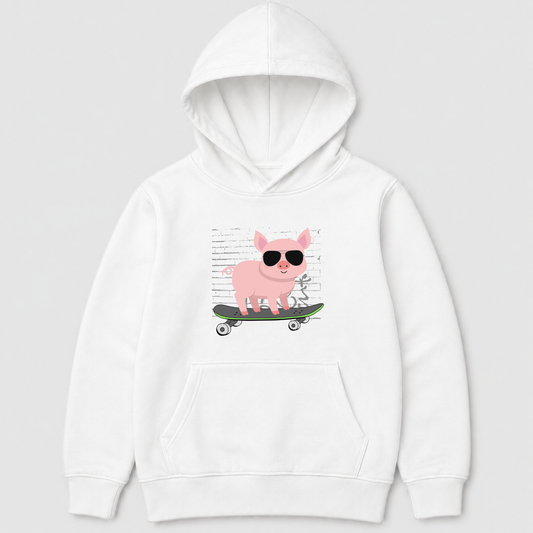 White kids skateboarding pig hoodie with a pink pig wearing black sunglasses on a skateboard in front of a brick wall graphic.