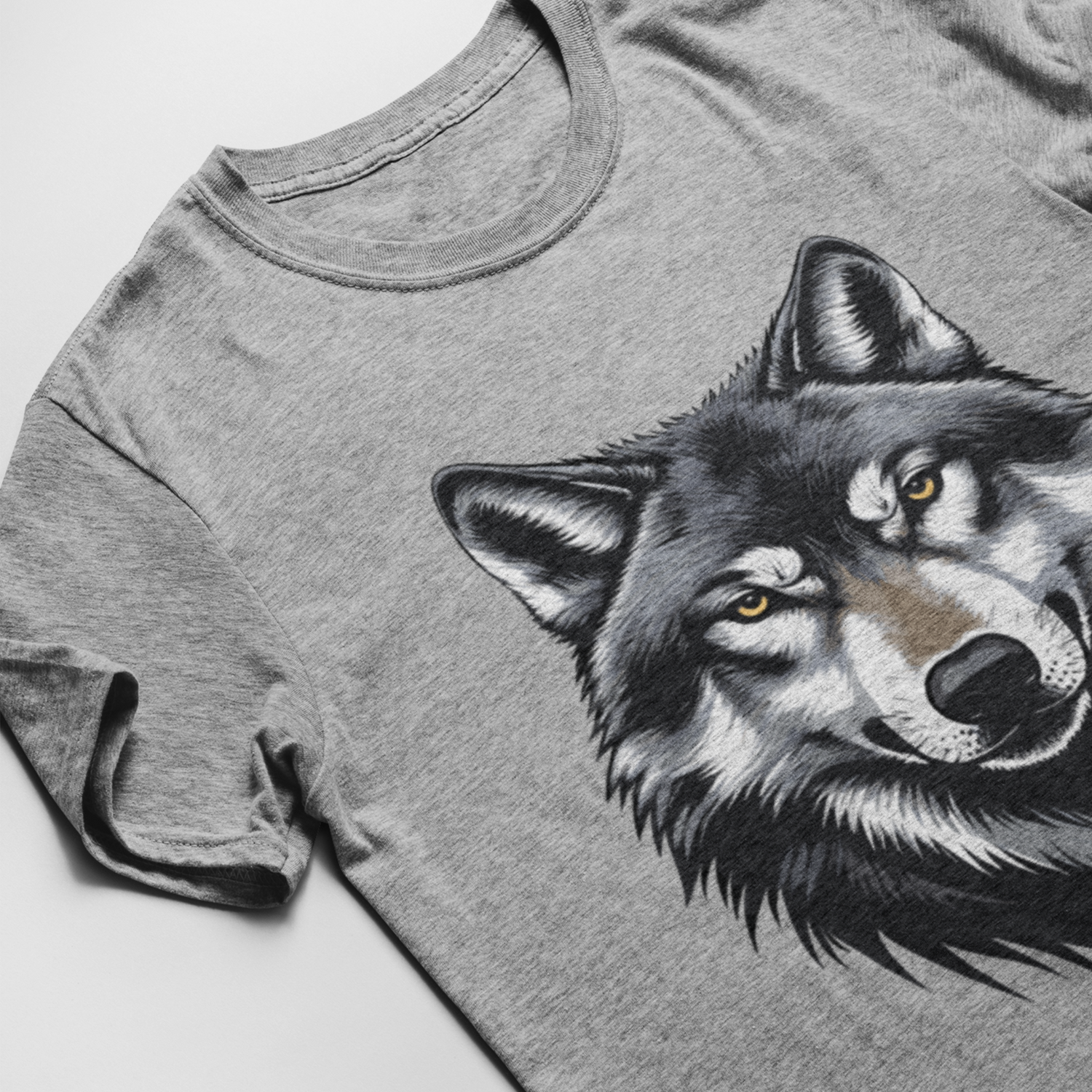 Gray t-shirt with a wolf graphic on a light gray background