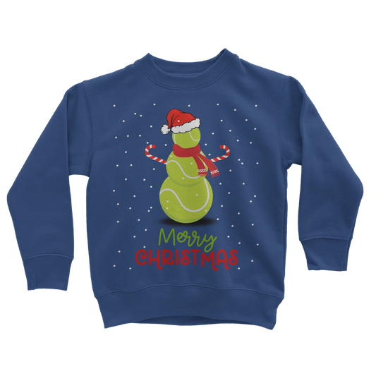 Kids royal-blue Christmas sweatshirt featuring a festive snowman made of tennis balls, wearing a Santa hat and red scarf, with falling snow and “Merry Christmas” text.