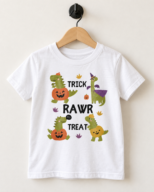 White kids Trick Rawr Treat dinosaur Halloween T-shirt displayed on a wooden hanger and black wall hook.