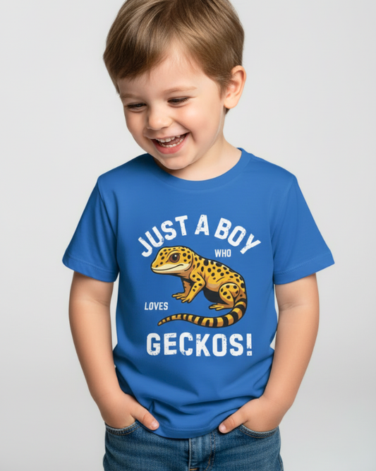 Boys royal blue gecko lover t-shirt featuring leopard gecko print and “Just a Boy Who Loves Geckos” text, modelled against grey background.