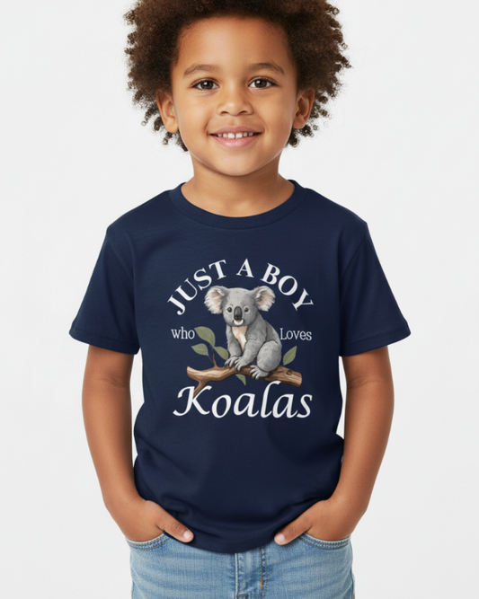 Child modelling navy “Just a Boy Who Loves Koalas” t-shirt, kids koala design top studio photo