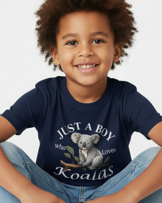 Close-up boy wearing navy koala t-shirt with “Just a Boy Who Loves Koalas” design, kids graphic tee