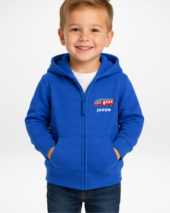 Kids personalised fire truck zip hoodie with name Jaxon, blue children’s firefighter hoodie, boy wearing custom fire engine jacket