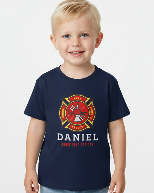 Kids personalised firefighter t-shirt with name Daniel, navy chief fire officer design, boy wearing custom fire engine t-shirt