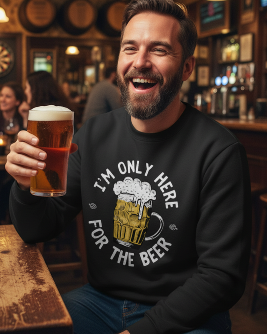 Man wearing black I’m Only Here for the Beer sweatshirt in a pub