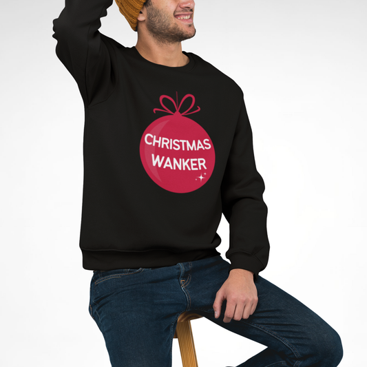 Man wearing black funny “Christmas Wanker” Christmas sweatshirt with red bauble graphic