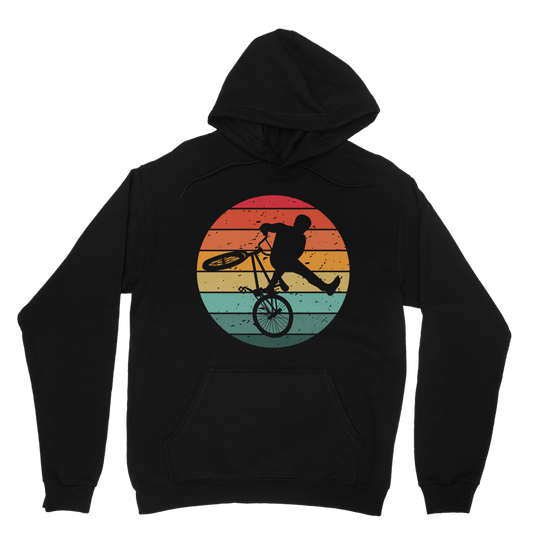 Black men’s pullover hoodie with retro sunset circle and BMX rider silhouette performing a trick