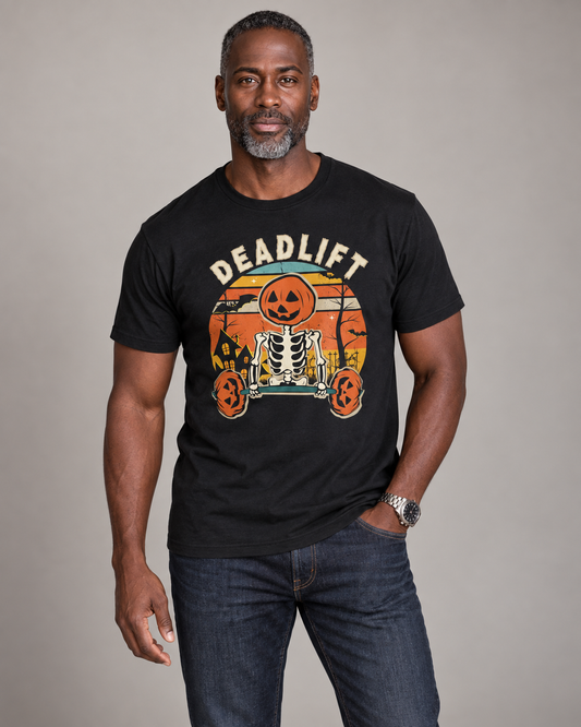 Man wearing a black Deadlift Halloween T-shirt with a pumpkin skeleton weightlifting design.
