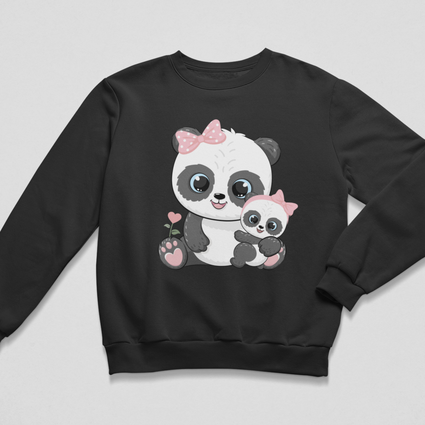 A black crewneck sweatshirt featuring a cute cartoon panda and baby panda graphic on the front, set against a light gray background.