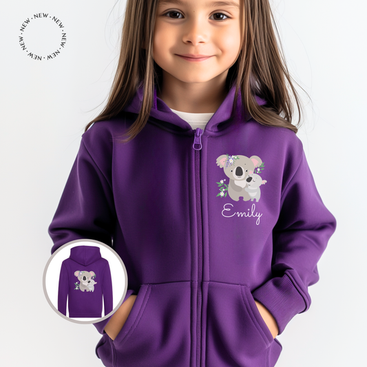 A girl wearing a purple full zip hoodie with a Koala motif with the name "Emily" printed underneath