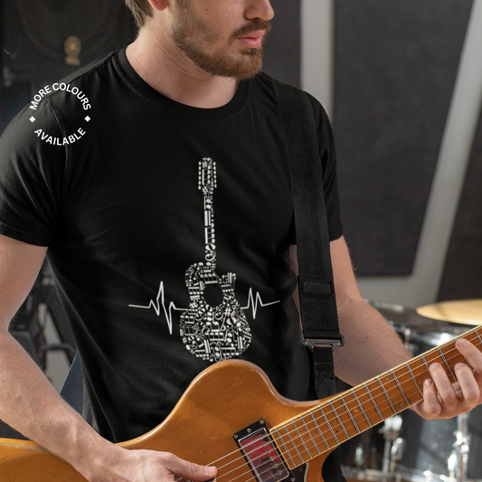 A man wearing a black t-shirt with a graphic of a guitar made from musical notes and a heartbeat line, playing an acoustic guitar.