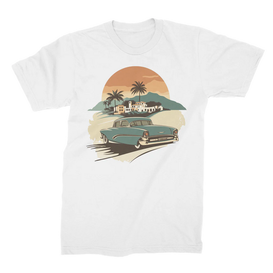 White t-shirt with retro graphic of a light blue classic car, sunset, palm trees, and a coastal town.