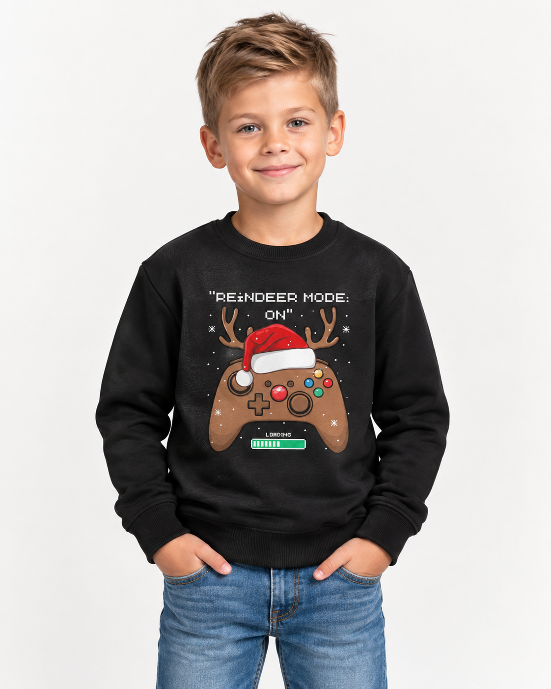 Smiling seven-year-old boy wearing a black gaming reindeer Christmas sweatshirt with blue jeans.