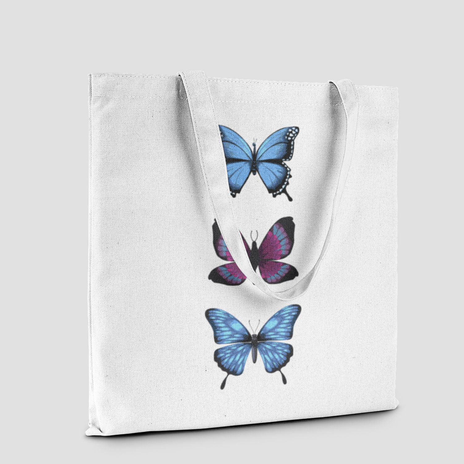 Lightweight white cotton tote bag with three pretty printed butterflies