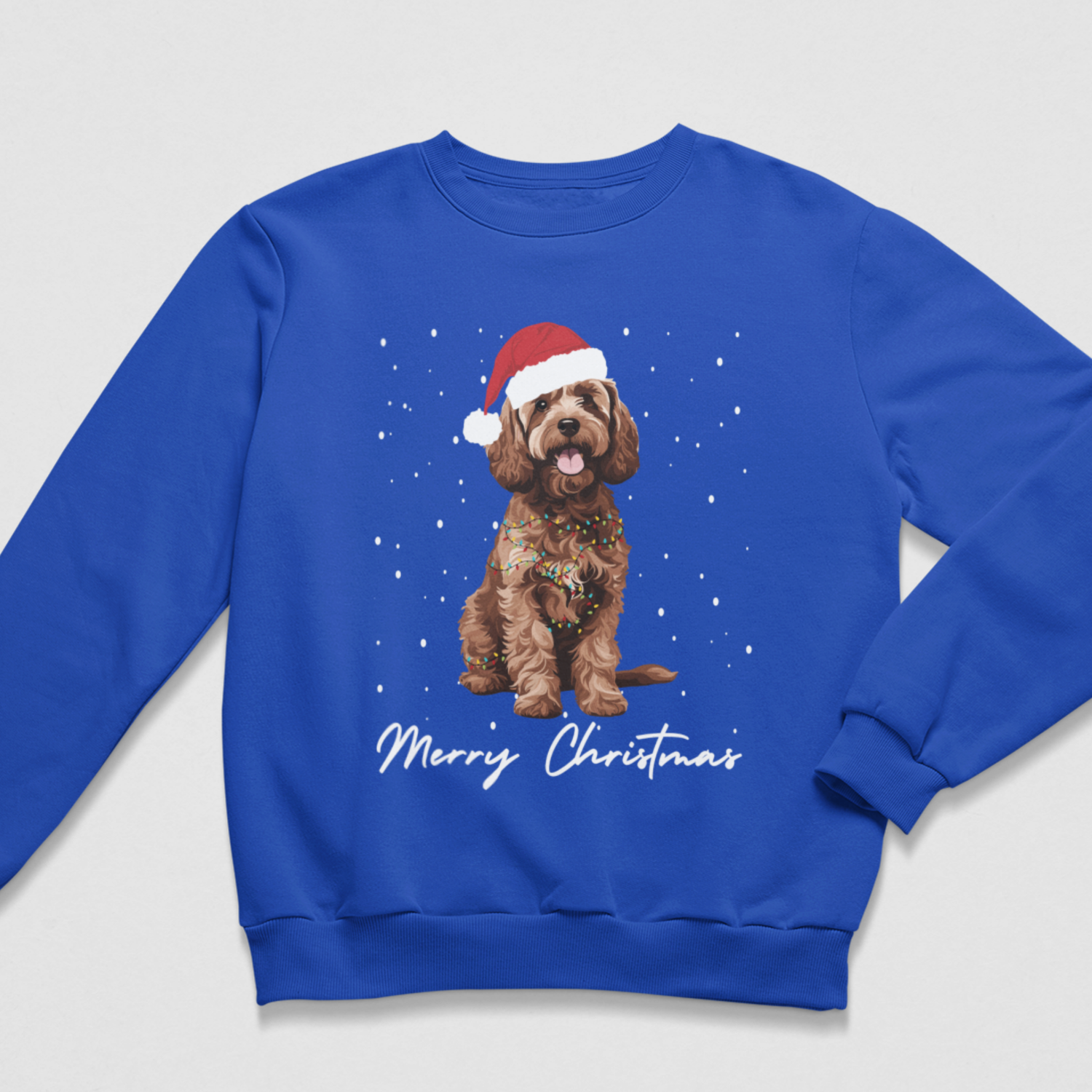 Royal blue unisex Christmas jumper with festive brown Cockapoo dog, Santa hat, Christmas lights and snowy design.