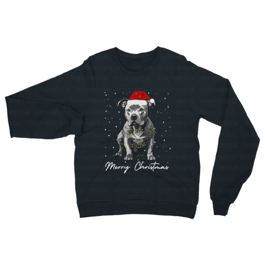 Adults navy Christmas sweatshirt with a Staffordshire Bull Terrier wearing a Santa hat, wrapped in fairy lights and 'Merry Christmas' text. 