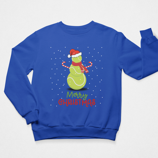 Unisex adults royal blue crewneck sweatshirt featuring a festive graphic of a green tennis ball snowman wearing a red Santa hat and scarf, surrounded by white snowflakes, with 'Merry Christmas' written below in green and red lettering.