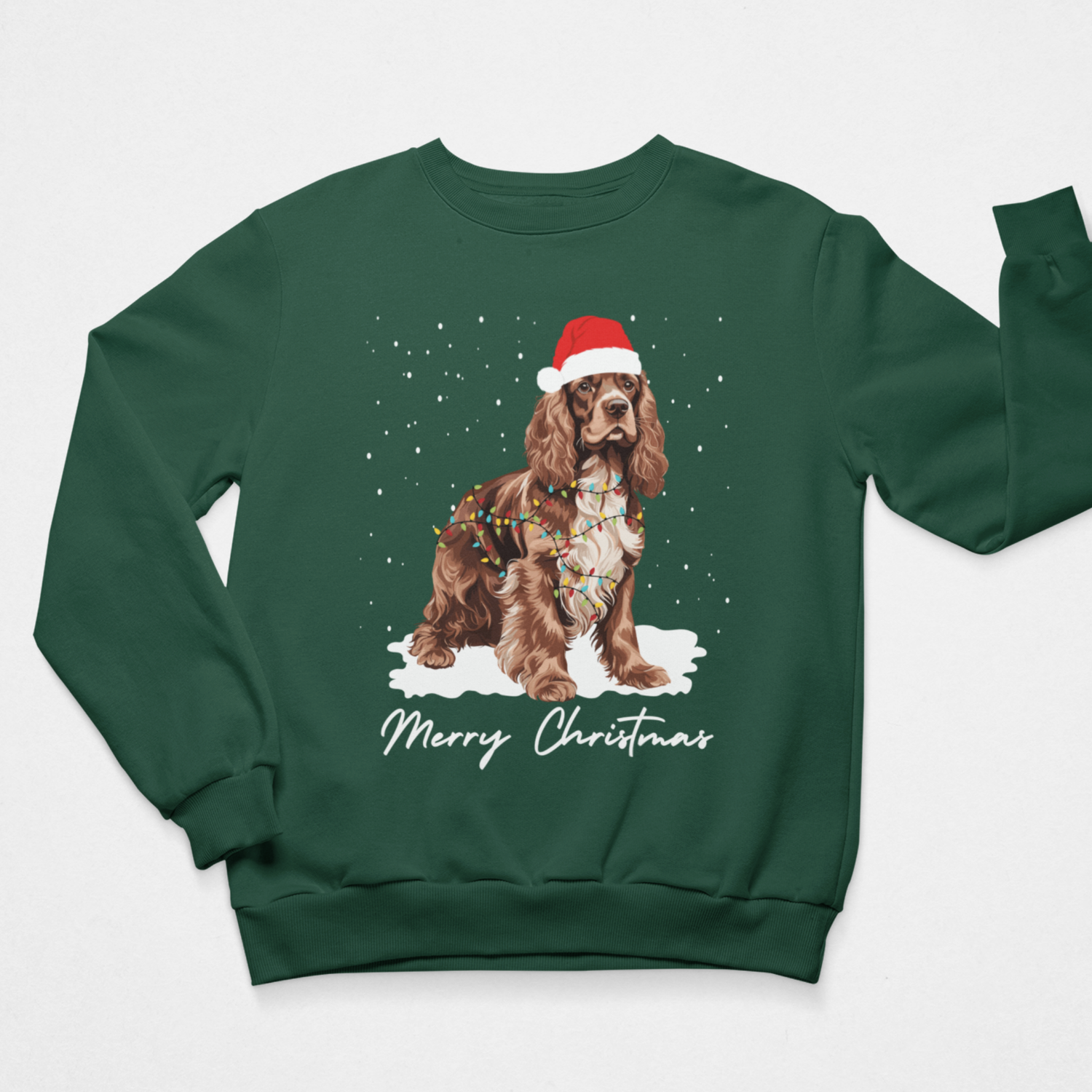 Dark green children’s Christmas sweatshirt featuring a festive Cocker Spaniel standing in snow with Santa hat and Merry Christmas wording.
