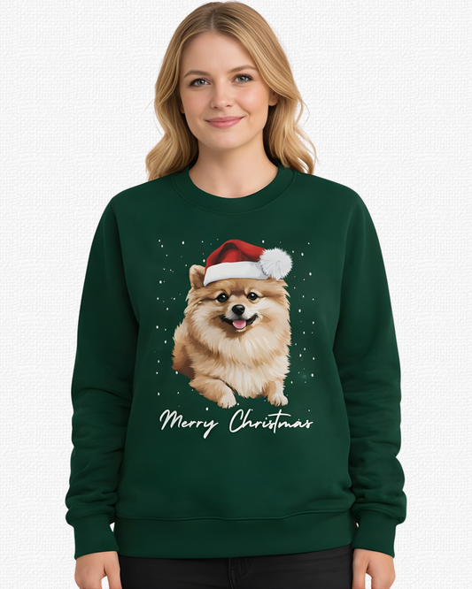 Woman wearing a dark green Pomeranian Christmas sweatshirt with Santa hat dog graphic and Merry Christmas text