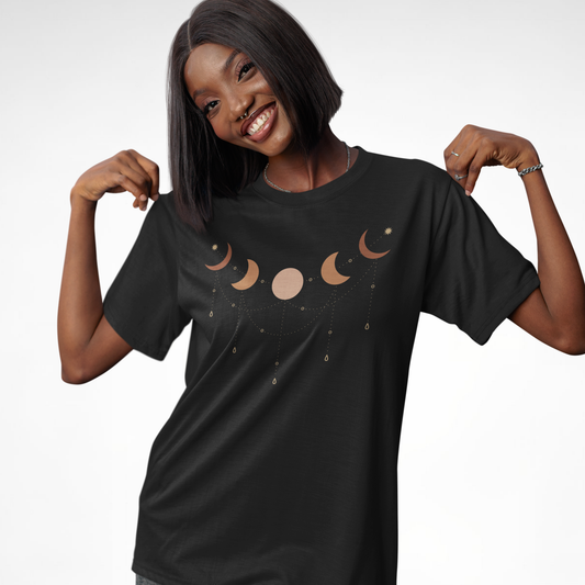 Woman modelling black luna phases of the moon t-shirt with minimalist celestial moon phase design, front view