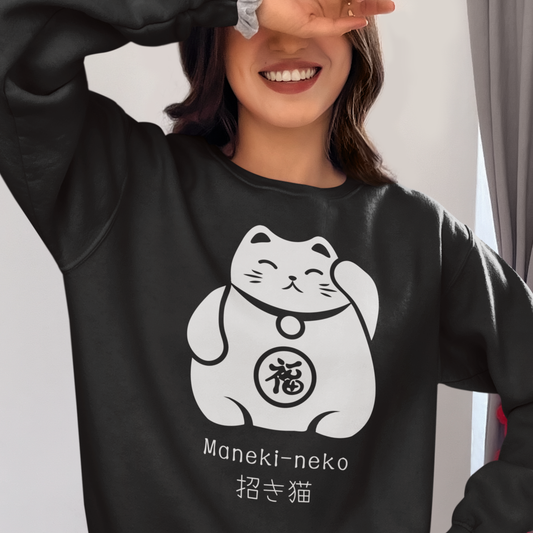 Woman wearing a black Maneki-neko Japanese Lucky Cat sweatshirt.