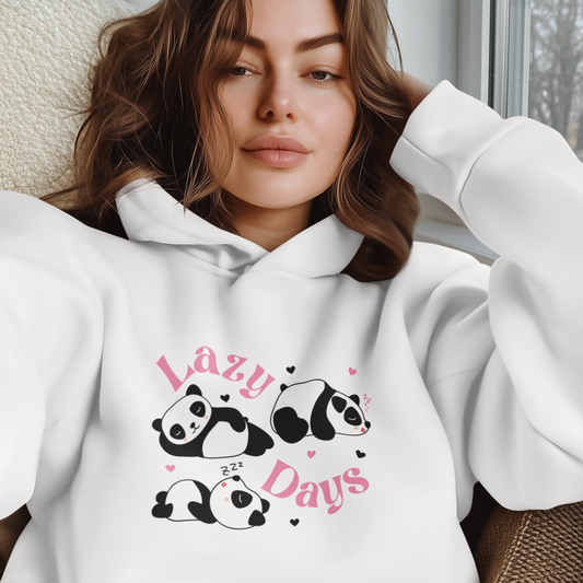 A woman wearing a white hoodie with a 'Lazy Days' text and panda designs on the front.