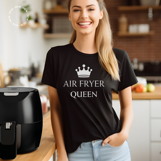 Woman wearing a black t-shirt with printed crown and the words "Air fryer Queen"