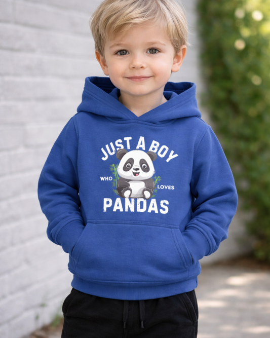 Smiling young boy wearing royal blue panda kids hoodie with “Just a Boy Who Loves Pandas” design outside