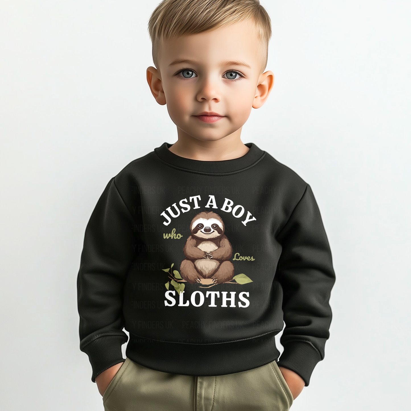 Young boy wearing a black kids sweatshirt with a cute sloth graphic and the text “Just A Boy Who Loves Sloths” on the front.