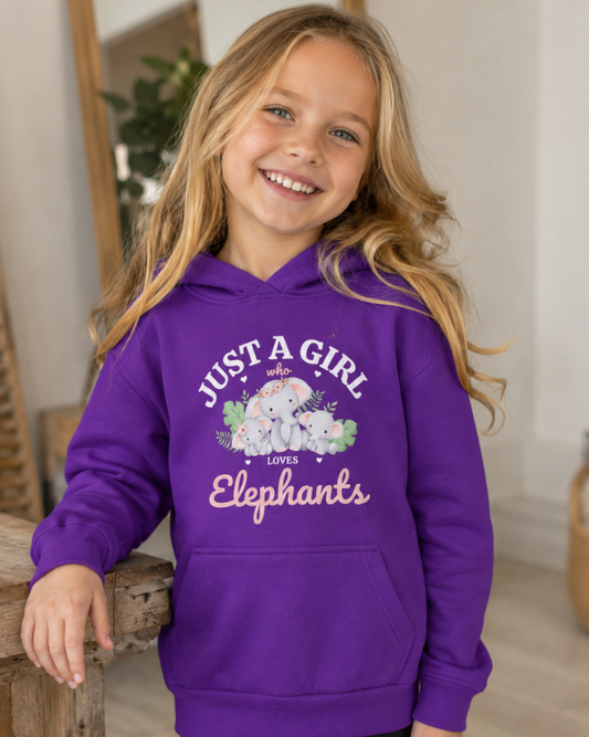 Girl wearing a purple hoodie with “Just a Girl Who Loves Elephants” design