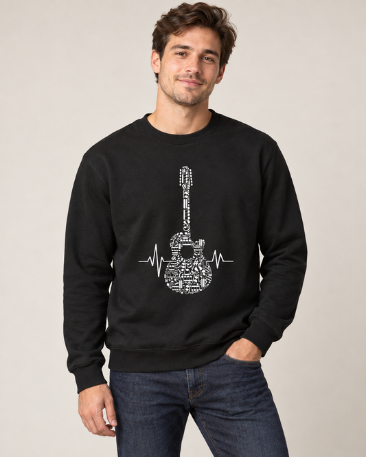 Young man wearing a black sweatshirt featuring a musical-note guitar and heartbeat design.