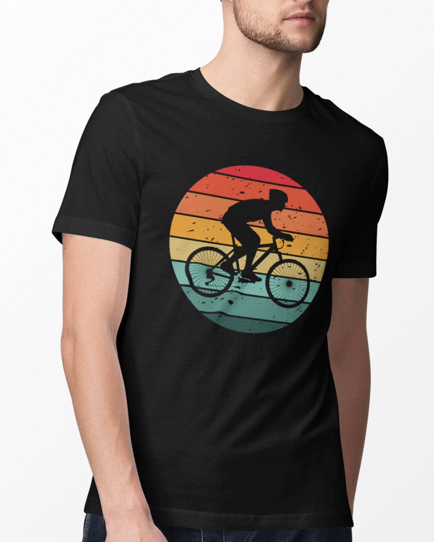Young man wearing a black T-shirt with a distressed retro sunset cyclist graphic.