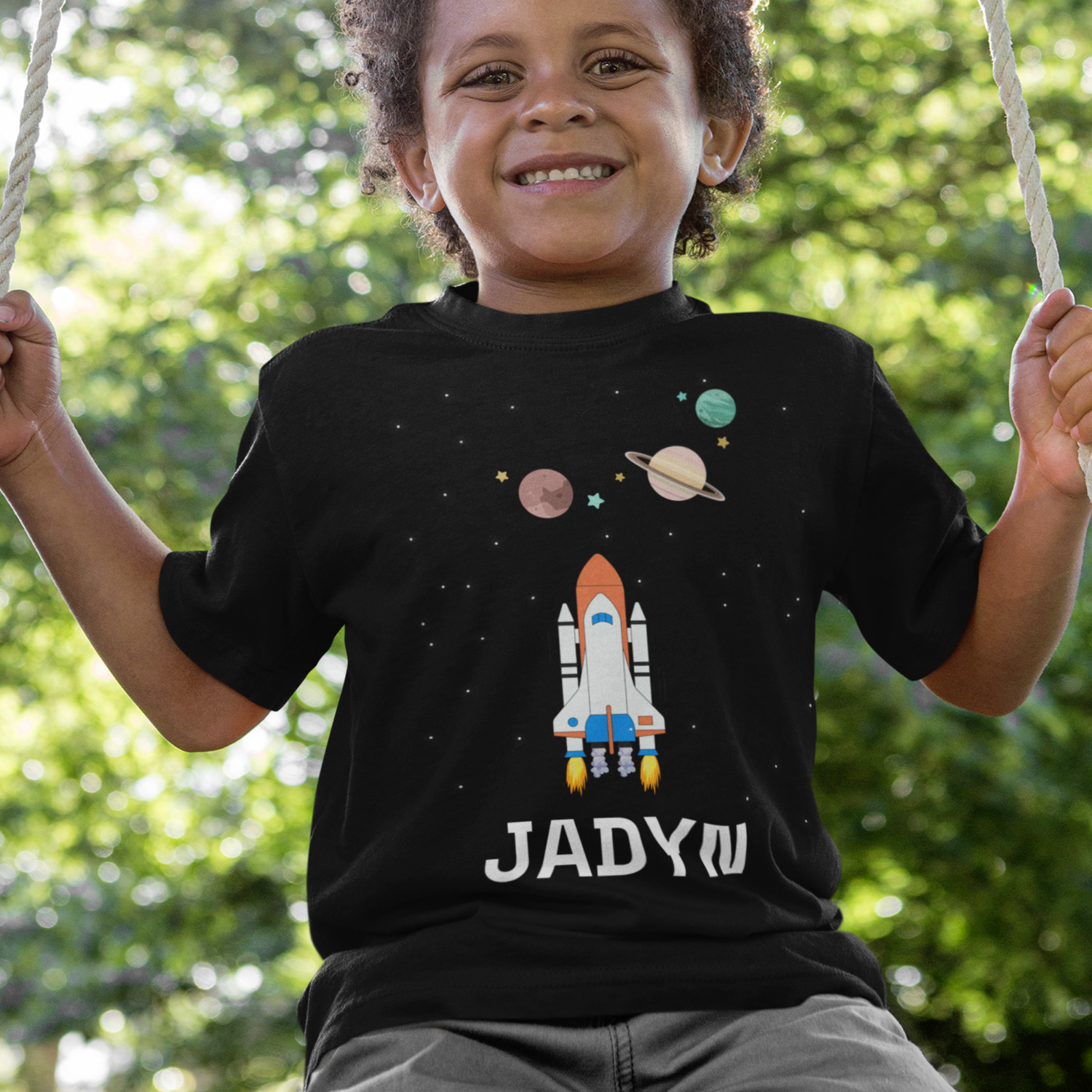 Black t-shirt with boy's name and space shuttle graphic