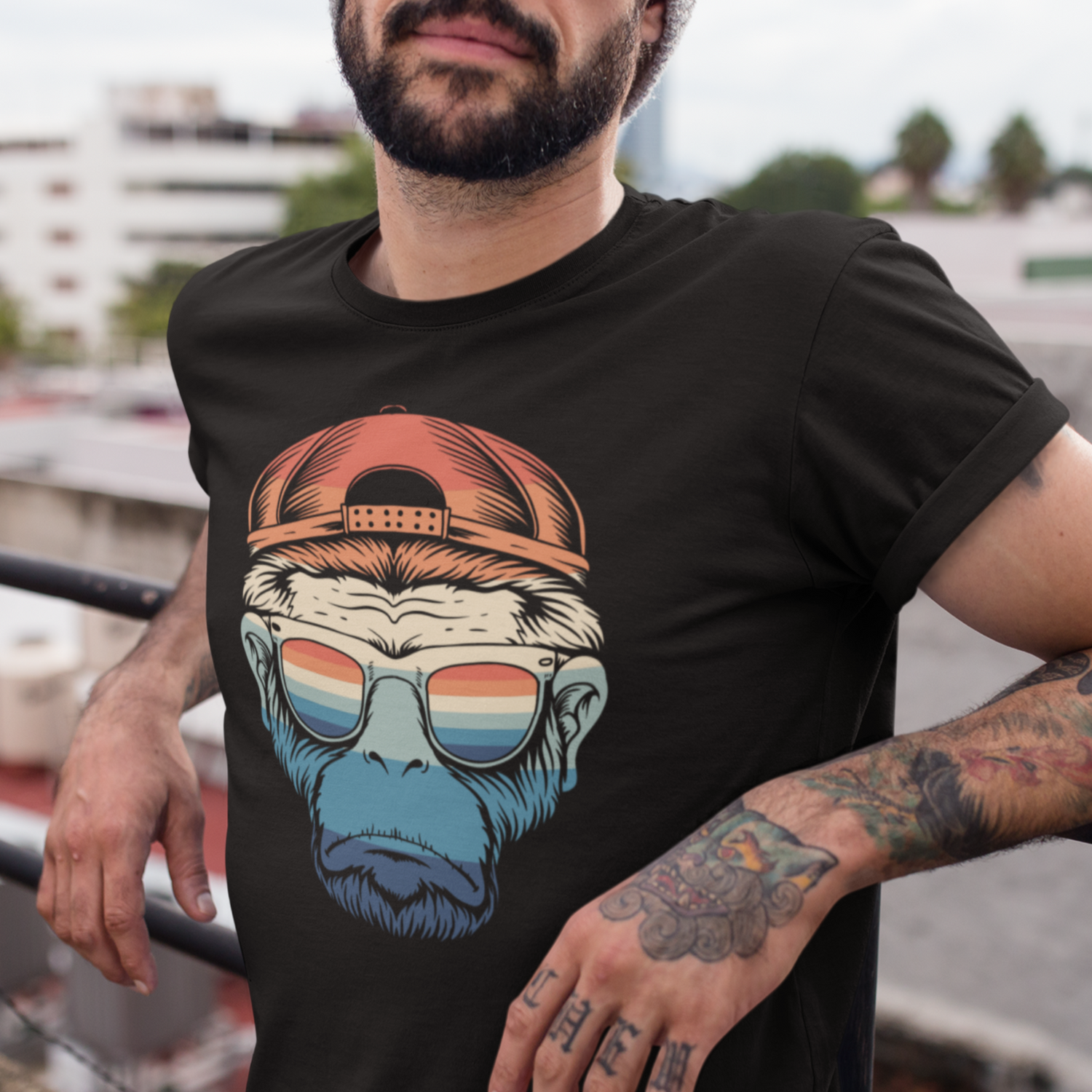 Men's black t-shirt featuring a retro Chimpanzee wearing a backwards baseball cap